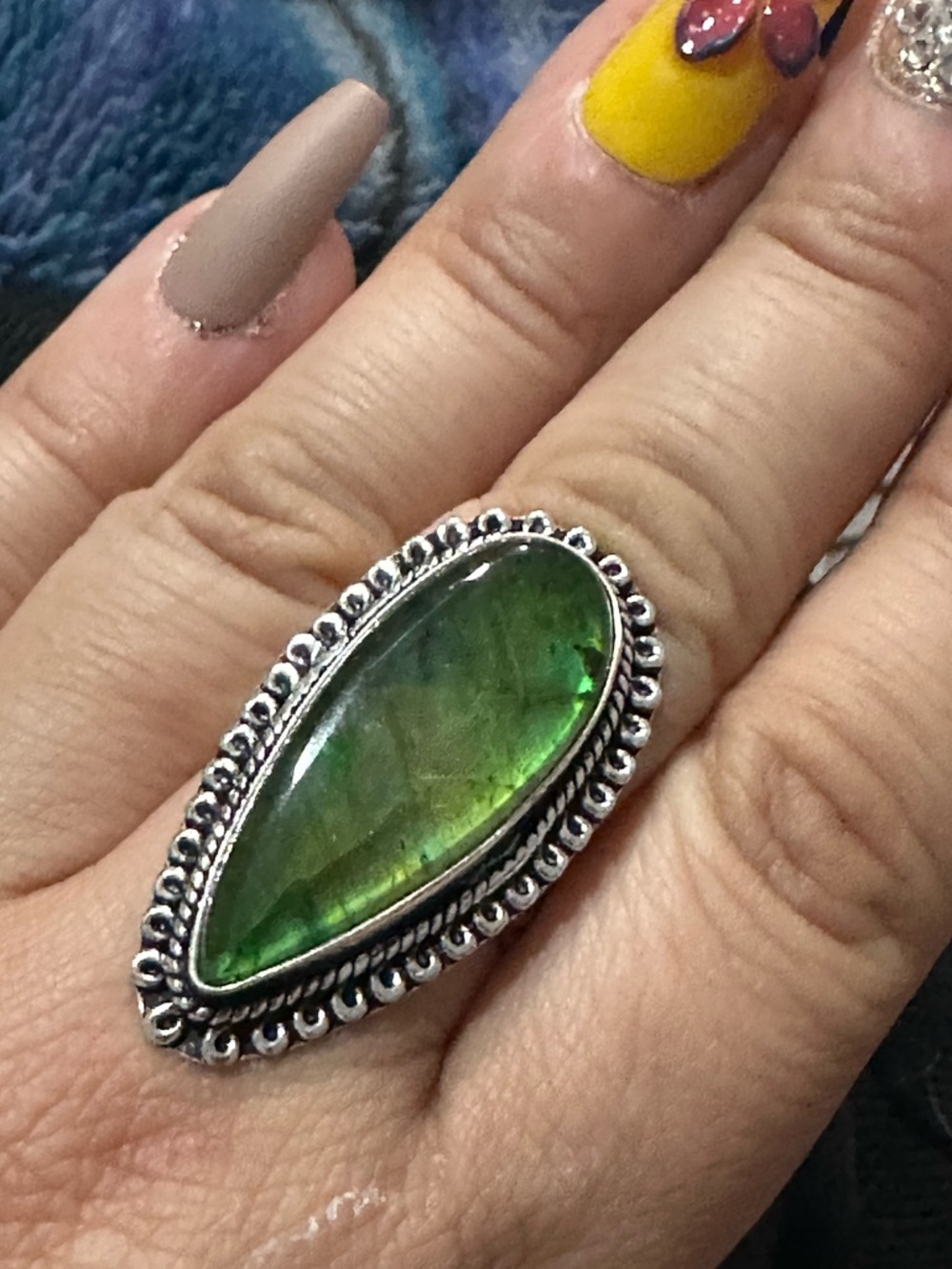 Green Labradorite Teardrop Ring with Detailed Silver-Style Setting